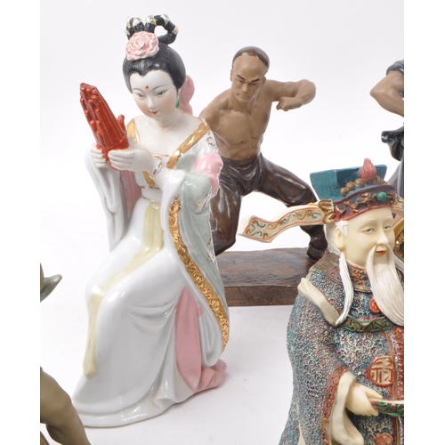 31 - Large collection of Chinese figurines, mostly comprising of mud men, action figures, female figures ... 