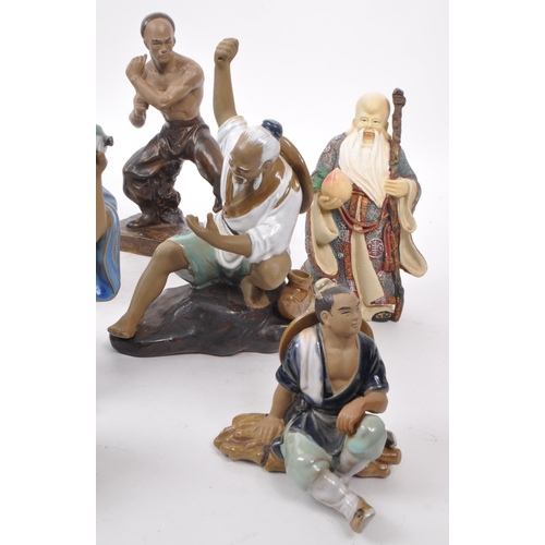 31 - Large collection of Chinese figurines, mostly comprising of mud men, action figures, female figures ... 