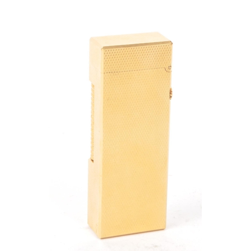 310 - Dunhill - A vintage 20th century Dunhill Rollagas rolled gold plated lighter. The lighter having eng... 