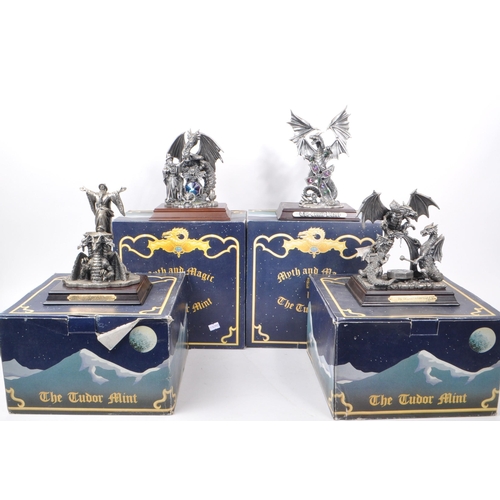 312 - Myth & Magic by The Tudor Mint - Four early 21st century cast pewter statue dragon figurines. In... 