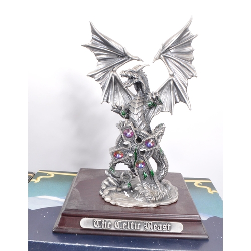 312 - Myth & Magic by The Tudor Mint - Four early 21st century cast pewter statue dragon figurines. In... 