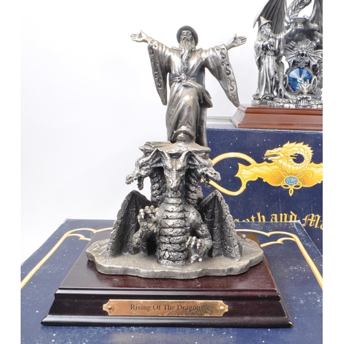 312 - Myth & Magic by The Tudor Mint - Four early 21st century cast pewter statue dragon figurines. In... 