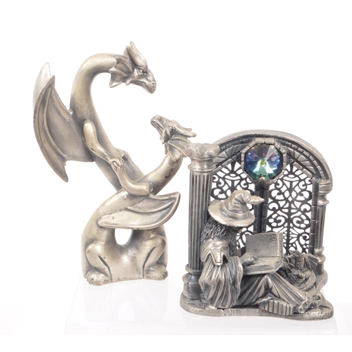 318 - Myth & Magic by The Tudor Mint - A collection of 24 early 21st century cast pewter statue dragon... 