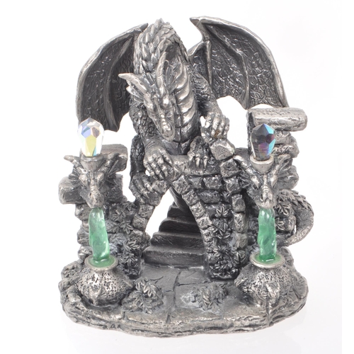 318 - Myth & Magic by The Tudor Mint - A collection of 24 early 21st century cast pewter statue dragon... 