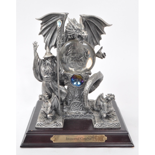 324 - Myth & Magic by The Tudor Mint - Four early 21st century cast pewter statue dragon and mythical ... 