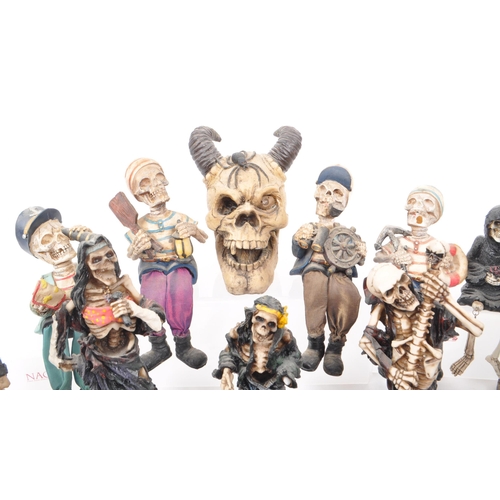 325 - A large collection of 21st century skeleton resin / plastic figures, to include: bobble head skeleto... 