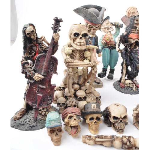 325 - A large collection of 21st century skeleton resin / plastic figures, to include: bobble head skeleto... 