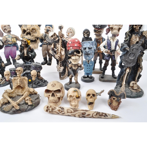 325 - A large collection of 21st century skeleton resin / plastic figures, to include: bobble head skeleto... 