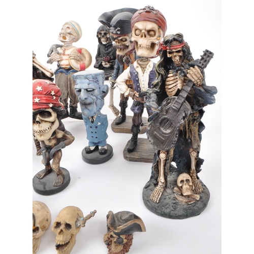 325 - A large collection of 21st century skeleton resin / plastic figures, to include: bobble head skeleto... 