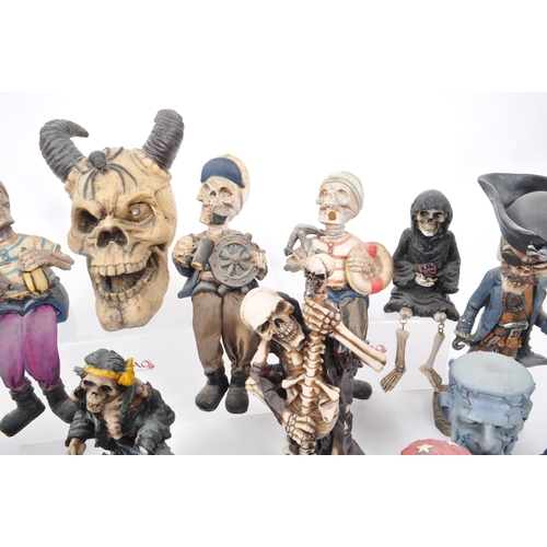 325 - A large collection of 21st century skeleton resin / plastic figures, to include: bobble head skeleto... 