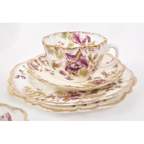 33 - Blyth Porcelain Company - Collection of early 20th century English diamond china tea service pieces,... 