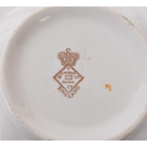 33 - Blyth Porcelain Company - Collection of early 20th century English diamond china tea service pieces,... 