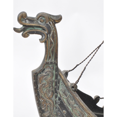 331 - A vintage 1970s believed to be Danish Iron Art patinated bronze Viking boat on a wooden stand, by Ed... 