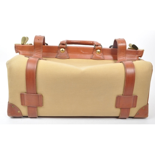 332 - Swaine Adeney Brigg - A vintage 20th century Swaine Adeney Brigg canvas and leather large coach / gl... 