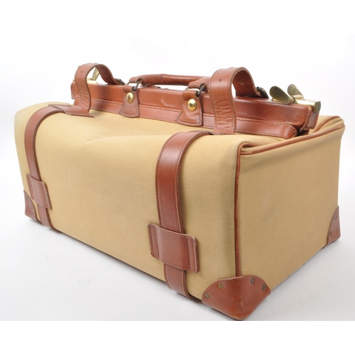 332 - Swaine Adeney Brigg - A vintage 20th century Swaine Adeney Brigg canvas and leather large coach / gl... 