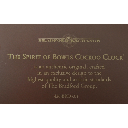 334 - The Bradford Exchange - A 21st-century 'The Spirit of The Bowls' cuckoo clock. The clock is crafted ... 