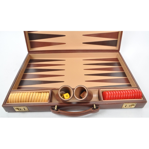 342 - Asprey - A vintage late 20th century circa 1990s leather backgammon attache / briefcase. The case ha... 