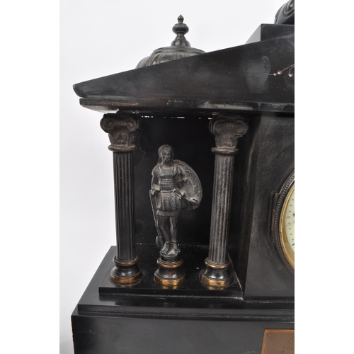 345 - An antique 1910 French slate mantel clock garniture, in three pieces. The slate clock features an en... 