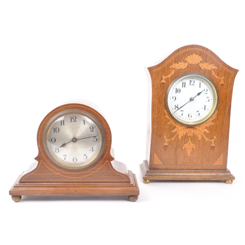 364 - Two Edwardian inlaid mahogany mantel clocks. One example with white face ebonised Roman numeral chap... 