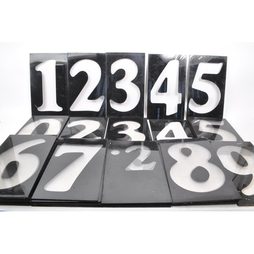 367 - A vintage set of plastic petrol station number slides, in black with the numbers being transparent. ... 