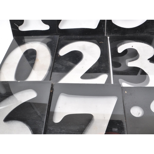 367 - A vintage set of plastic petrol station number slides, in black with the numbers being transparent. ... 