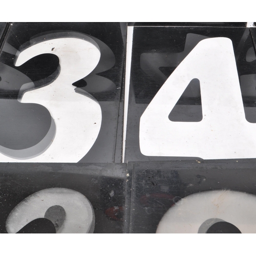 367 - A vintage set of plastic petrol station number slides, in black with the numbers being transparent. ... 