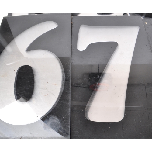 367 - A vintage set of plastic petrol station number slides, in black with the numbers being transparent. ... 