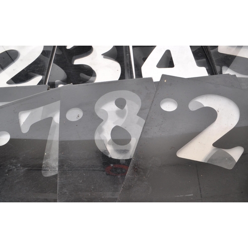 367 - A vintage set of plastic petrol station number slides, in black with the numbers being transparent. ... 