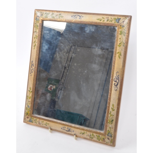 370 - A vintage early 20th-century hand-painted wall hanging mirror, in rectangular form. Featuring two gi... 