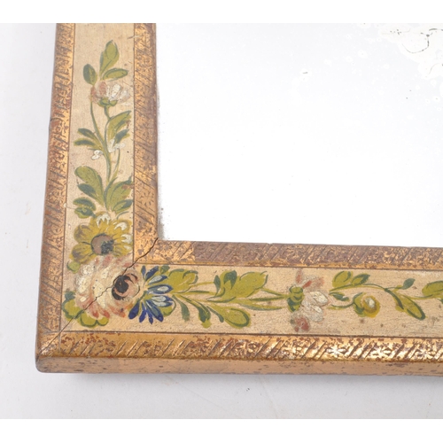 370 - A vintage early 20th-century hand-painted wall hanging mirror, in rectangular form. Featuring two gi... 