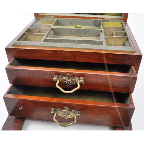 372 - A vintage 1915 mahogany carved jewellery box, inlaid with a brass handle and plaque that reads 'Pres... 