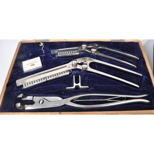 379 - A large collection of vintage, mostly 20th-century medical surgical tools. Including, a simplified g... 