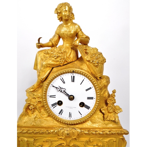 382 - A B Savory & Sons - A 19th-century vintage ormolu mantel clock, with a glass dome and key, raise... 