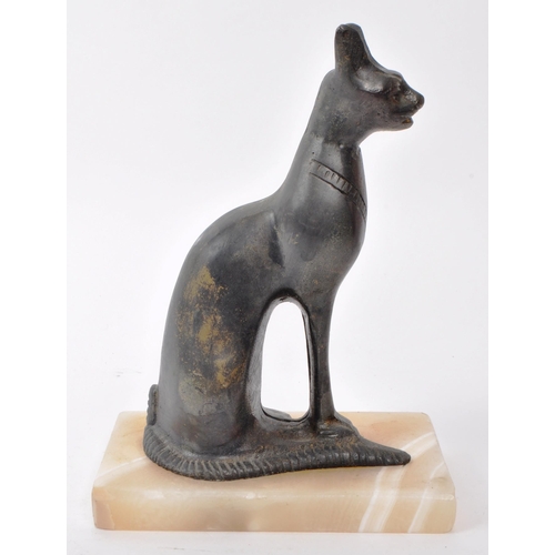 386 - A vintage 20th-century bronze statue of an Egyptian cat, screwed and raised onto a stone base. Measu... 