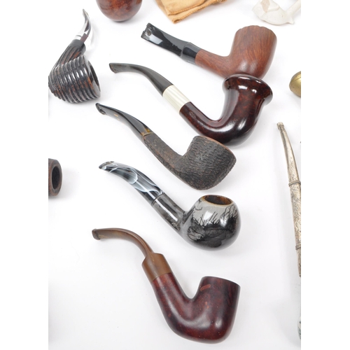 387 - A large collection of 20th century tobacco pipes. The collection featuring briar, wooden, ceramic, a... 