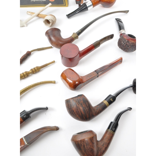 387 - A large collection of 20th century tobacco pipes. The collection featuring briar, wooden, ceramic, a... 