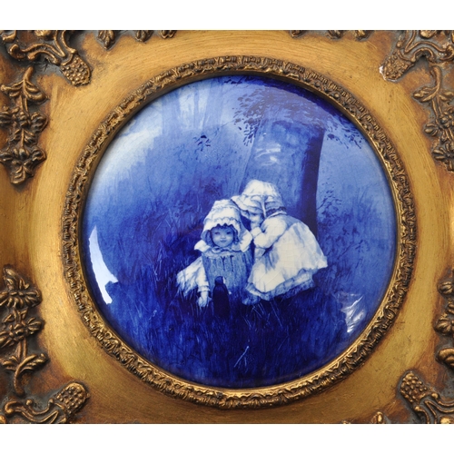 391 - Two vintage 20th-century framed Doulton-style blue / white porcelain plaques, both depicting two chi... 