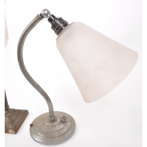 393 - Three vintage early 20th-century table lamps, including a lamp with an adjustable arm with a ceramic... 