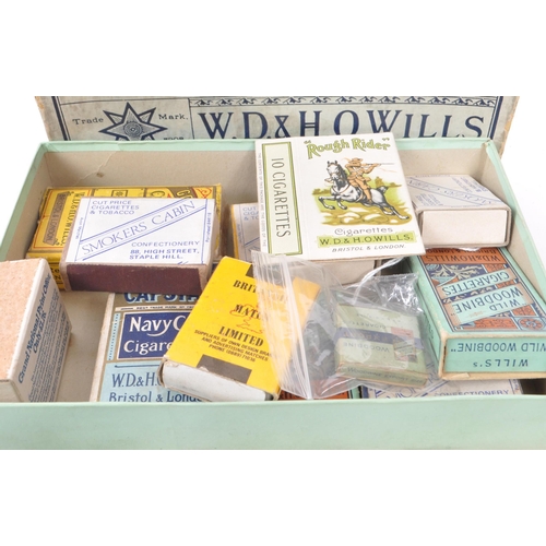 396 - A vintage 20th century collection of cigarette match packets. Including, Wild Woodbine, Rough Rider,... 