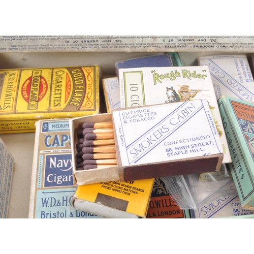 396 - A vintage 20th century collection of cigarette match packets. Including, Wild Woodbine, Rough Rider,... 