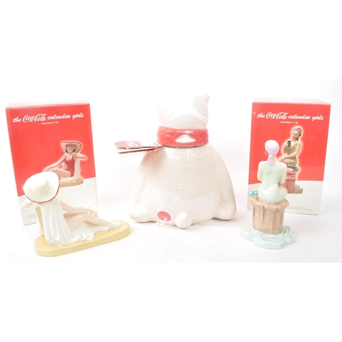 401 - Coca-Cola - A collection of vintage Coca Cola ceramic figures. The collection to include two limited... 