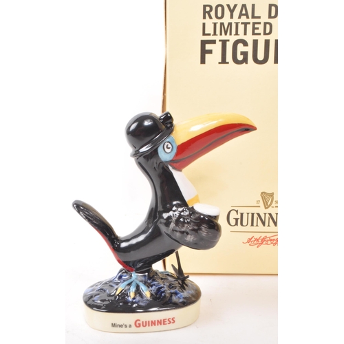 404 - Guinness - Royal Doulton - Two vintage Royal Doulton for Guinness ceramic figures. One figure being ... 