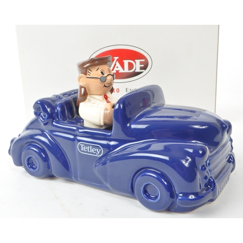 412 - Wade - Tetley - Two vintage Wade for Tetley Tea ceramic money box figures. Each figure in a deep blu... 