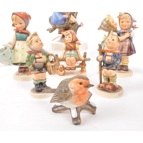 415 - W. German - Goebel - M J Hummels - Collection of porcelain bisque figurines / statues. To include, t... 