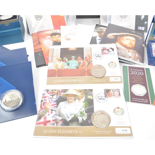 421 - The Royal Mint - A large collection of British commemorative and proof coins and medals. The collect... 