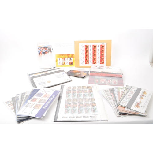 423 - A collection of 21st-century British Royal Mail stamp presentation packs. The collection includes ex... 