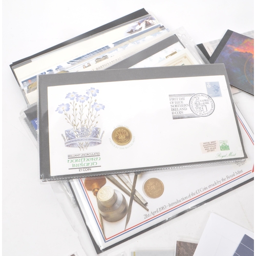 423 - A collection of 21st-century British Royal Mail stamp presentation packs. The collection includes ex... 