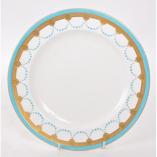 43 - Mintons - A vintage 19th century jewelled blue and white plate, with gilt decoration to the border. ... 