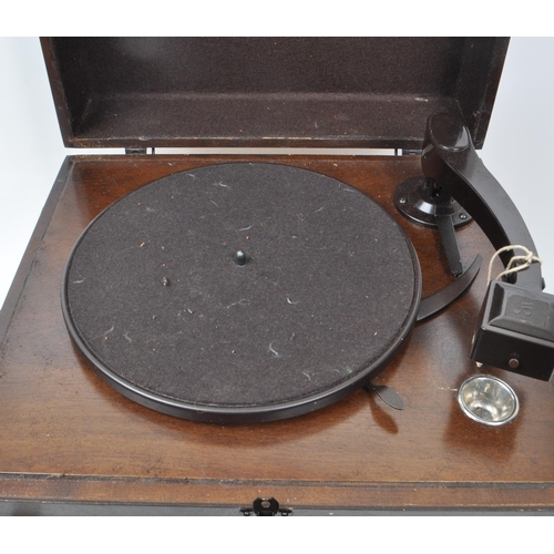 433 - Columbia - HMV - An early 20th-century A.C. record player, model 2100. With a wooden case and bakeli... 