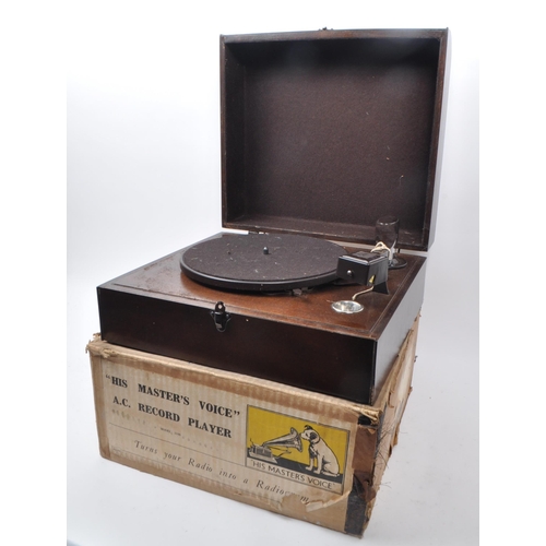 433 - Columbia - HMV - An early 20th-century A.C. record player, model 2100. With a wooden case and bakeli... 